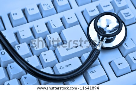 stethoscope on a keyboard in cool blue