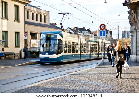 ZURICH-APRIL 21: Electric tram in the city of Zurich, Switzerland on April 21, 2012. Trams have been a consistent part of Zurich\'s streetscape since the 1880s.
