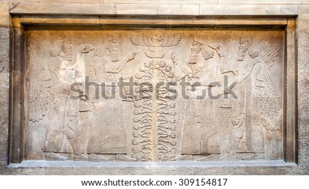 LONDON, UNITED KINGDOM - APRIL 10, 2015: Assyrian's relief in The British Museum. The museum was established in 1753. The museum received a record 6.7 million visitors in 2013.