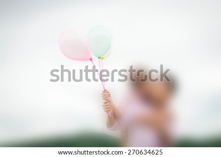 summer holidays, celebration and dating concept - couple with pastel balloons