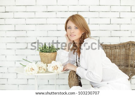 Beautiful woman resting in summer cafe
