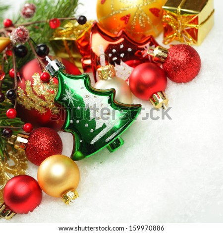 Christmas decorations and Xmas tree on white winter snow background