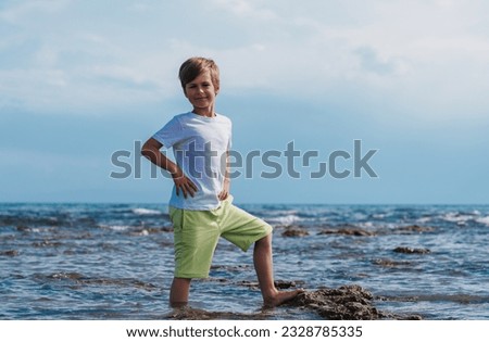 Similar – Foto Bild Auf Stein stehender Junge mit VR-Brille gegen Berg