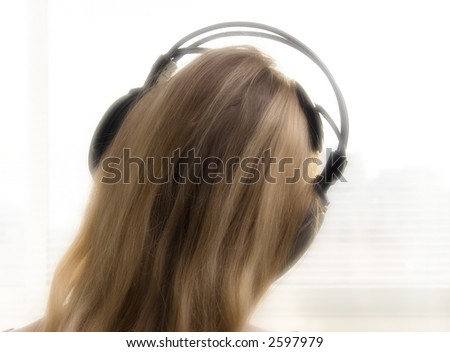 Early morning. Girl with headphones. Special computer modified image.