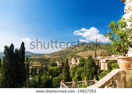 Traditional Toscana Italy landscape. Lemon tree and stairs on a foreground.