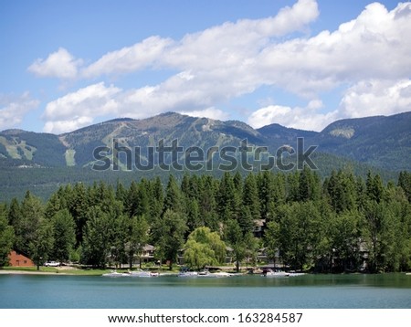 Blue Lake with Ski Mountain in the Background during Summer