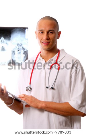 Handsome Doc A young and handsome doctor with notes in his hands and x-rays of a skull in the background. A high-key shot!