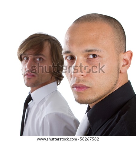 Two young businessman - one asian and one caucasian isolated over white background.