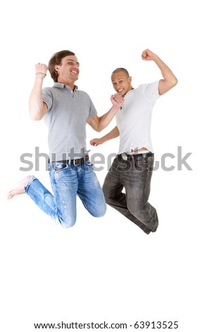 Two young successfull jumping in joy! Two handsome multiracial models.