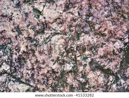 Granite pattern. Outdoor photo (with small trace of moss)