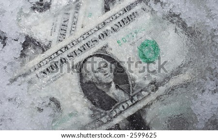 Conceptual composition: money under ice (frozen account)