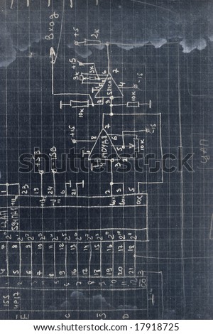 Special color effect image: handwriting electronics scheme on a squared stained school paper. Blueprint effect