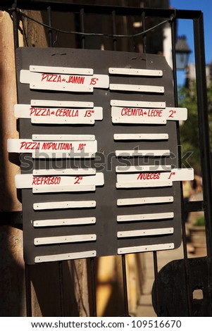 Pizza price list and menu board in Havana, Cuba