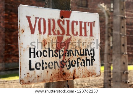 Caution, danger high voltage sign Auschwitz concentration camp, Poland