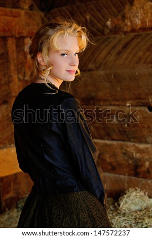 Young Girl dressed in 1800s Vintage Clothing