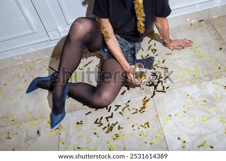 Similar – Image, Stock Photo Crop person having champagne poured into glass near pool
