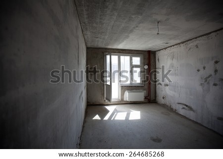 Empty walls concrete room interior. window in new room