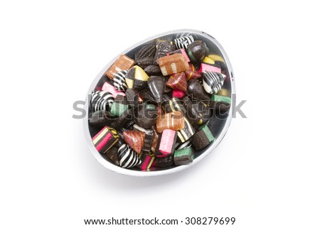 Hard rock candy in an oval candy bowl