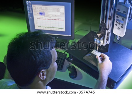 Quality control technician measuring various small objects for quality issues