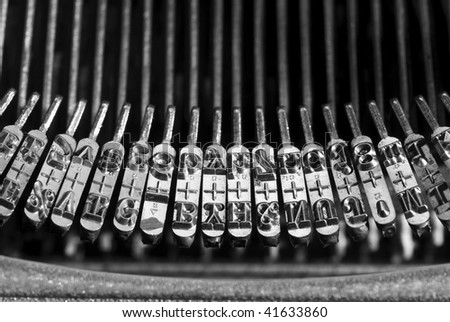 strike head consisting of letters and numbers on vintage typewriter