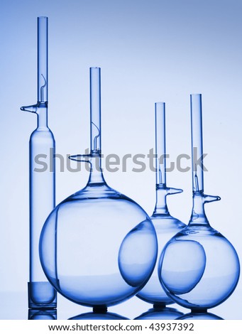 Glass laboratory flasks and beakers for science research