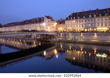 Night scene of Quai Vauban in the city of Besancon (Franche-Comte province in eastern France).