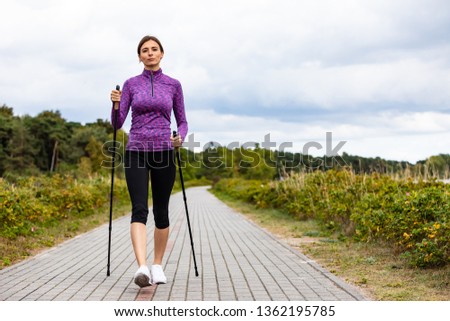 Similar – Image, Stock Photo Young and sportive woman portrait in a park