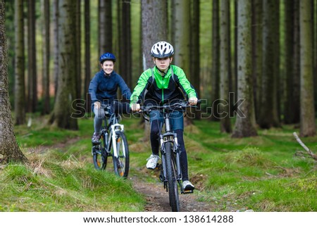 Young people riding bikes