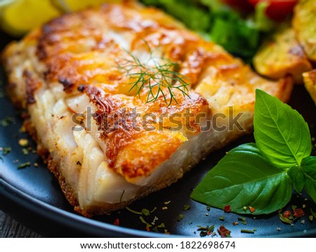 Similar – Image, Stock Photo Grilled fish and potatoes with scallion and sauce