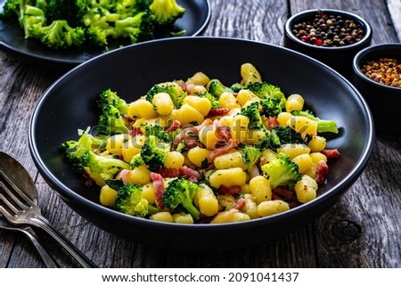 Similar – Image, Stock Photo Preparing a ham salad with rice to take away. The containers used are compostable.