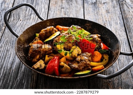 Similar – Image, Stock Photo Pan with fried chicken and vegetables