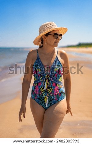 Similar – Image, Stock Photo Smiling women in swimsuits on sandy beach near ocean