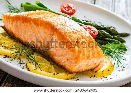 Similar – Image, Stock Photo Served salmon steak with beans and couscous