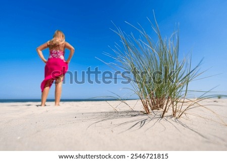 Image, Stock Photo Woman with pink pareo on sandy beach