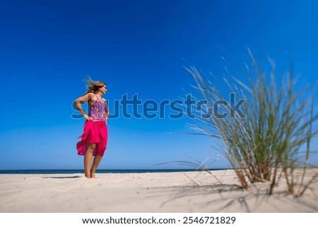 Similar – Image, Stock Photo Woman with pink pareo on sandy beach