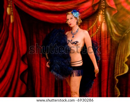 Burlesque performer shot in a studio setting.