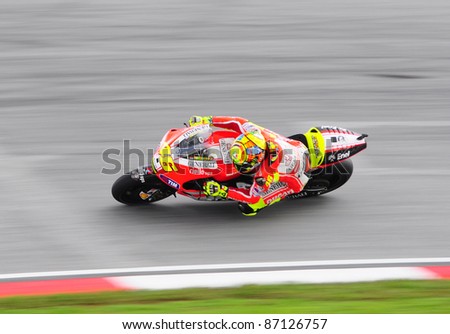 SEPANG,MALAYSIA-OCT.21:Valentino Rossi of Ducati Team in action during practice session of Shell Advance Malaysian Moto GrandPrix on Oct. 21 2011 in Sepang, Malaysia. The MotoGP class race will be held on Oct. 23, 2011.