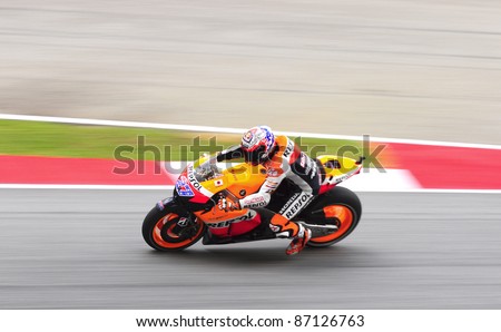 SEPANG,MALAYSIA-OCT.21:Casey Stoner of Repsol Honda in action during practice session of Shell Advance Malaysian Moto GrandPrix on Oct. 21 2011 in Sepang, Malaysia. The MotoGP class race will be held on Oct. 23, 2011.