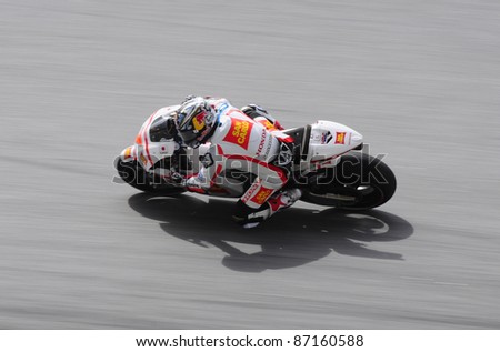 SEPANG, MALAYSIA-OCT.21:Aoyama in action during practice session of Shell Advance Malaysian Moto GrandPrix on Oct. 21 2011 in Sepang, Malaysia. The MotoGP class race will be held on Oct. 23, 2011.