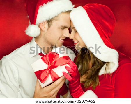 man and woman at christmas