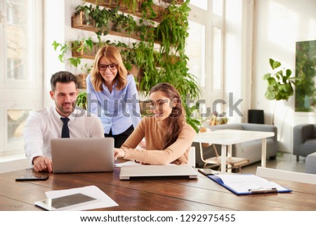 Similar – Image, Stock Photo Portrait of a causasian blonde.  She is looking directly at the camera covered in a floral patterned scarf.