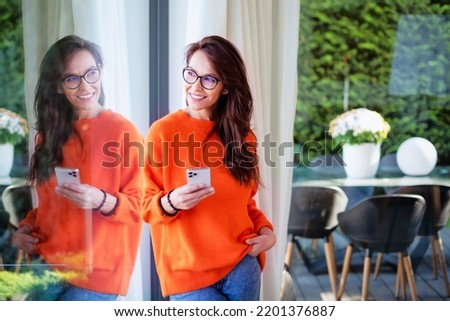 Similar – Image, Stock Photo Relaxed adult female looking at camera in sunlight