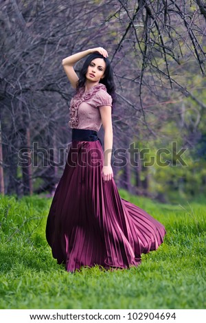 Portrait of romantic woman at fairy forest