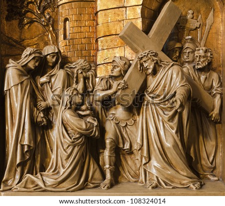 BRUSSELS - JUNE 24: Jesus meets the women of Jerusalem. Relief from Cross way in Saint Antoine church on June 24, 2012 in Brussels.