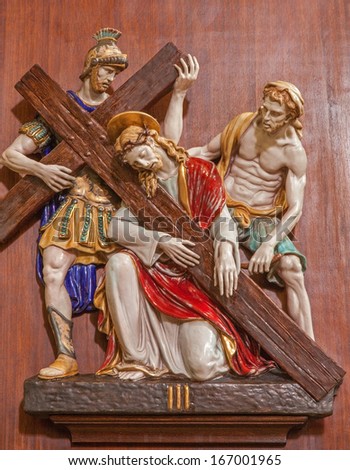 VERONA - JANUARY 28: Jesus fall under corss. One part of ceramic coss way from st. Nicholas church (Chiesa di San Nicolo) on January 28, 2013 in Verona, Italy.