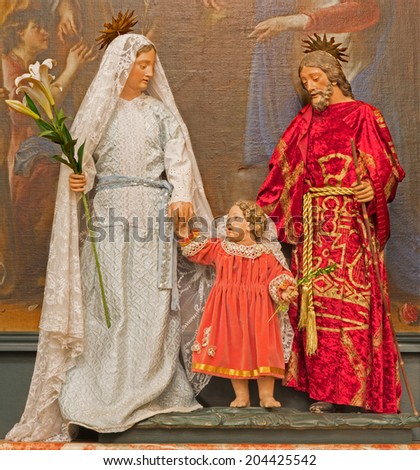 BRUSSELS, BELGIUM - JUNE 16, 2014: The Holy family in the dress in church Eglise de St Jean et St Etienne aux Minimes.