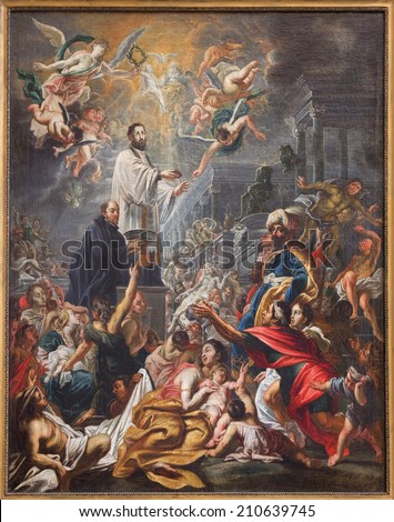 BRUGES, BELGIUM - JUNE 12, 2014: The paint Saint Franics Xavier baptist the indians by Cornelis Schut 1648 in Saint Walburga church.