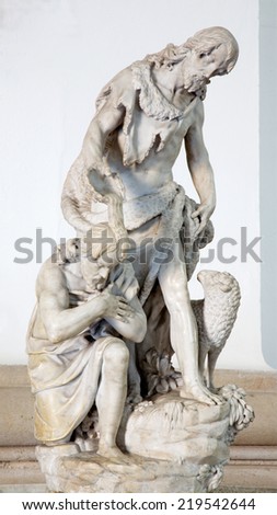 PADUA, ITALY - SEPTEMBER 8, 2014: The statue of the baptism of christ scene in the Cathedral of Santa Maria Assunta (Duomo)