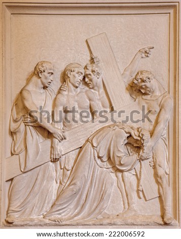 BRUSSELS, BELGIUM - JUNE 15, 2014: Stone relief the Fall of Jesus under cross scene in church Notre Dame du Bon Secource.