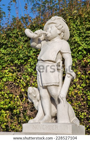 Vienna - The symbolic sculpture of november month in the gardens of Belvedere palace.